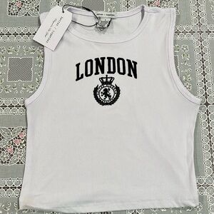 White tank top with black lettering